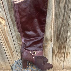 cowhide burgundy boots.